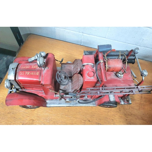 70 - Modern tin plate fire engine. 

39cm long