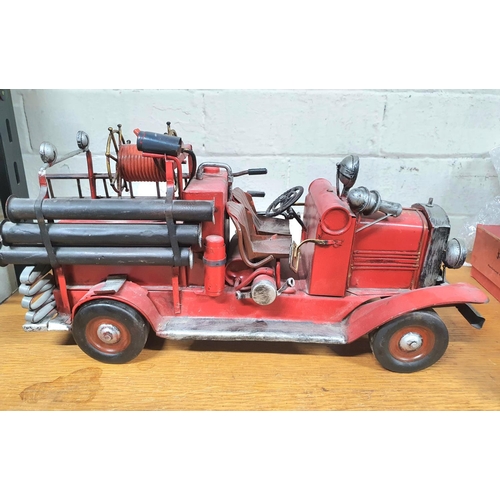 70 - Modern tin plate fire engine. 

39cm long