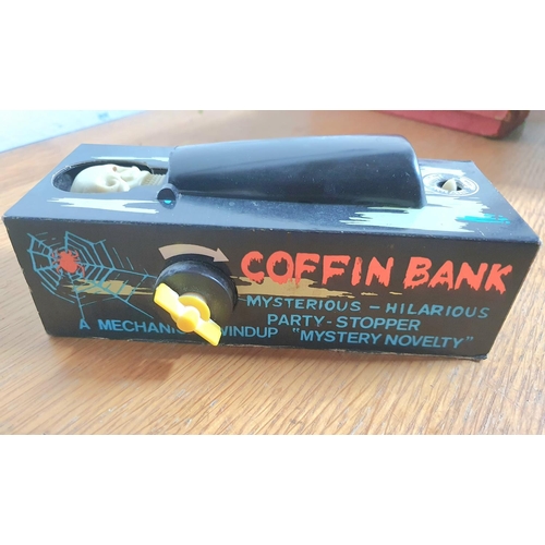 78 - Vintage plastic Coffin Bank