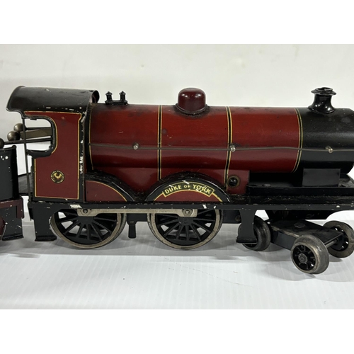 91 - A Bassett-Lowke gauge 0 clockwork 4-4-0 locomotive no. 1927 