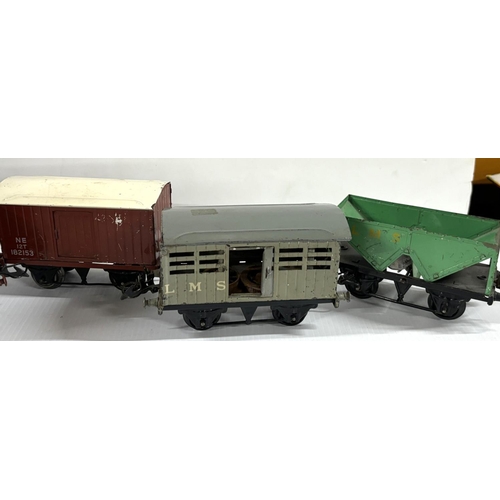 106 - 4 carriages including Hornby with contents