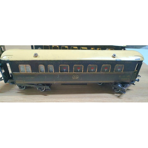 107 - Hornby by Meccano 4 tin-plate 0 gauge carriages including a Pullman, a Compangie Internationale des ... 