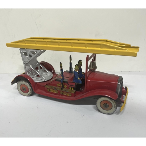 150 - Tin Plate vintage clockwork fire engine . 36cm long possibly Nomura Japan