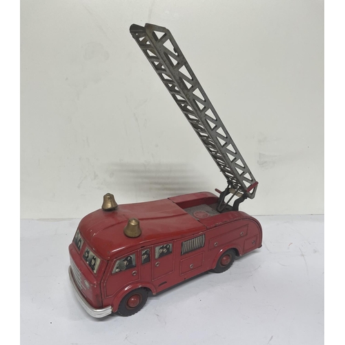 151 - Vintage Arnold West Germany tin plate fire engine . 28cm long