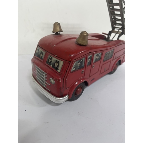 151 - Vintage Arnold West Germany tin plate fire engine . 28cm long