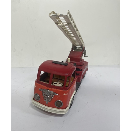 152 - Vintage Gama tin plate fire engine,

30cm long