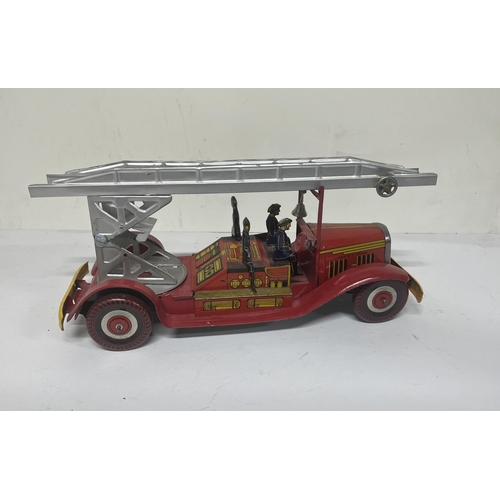 155 - Mettoy vintage tin plate fire engine,

36cm long