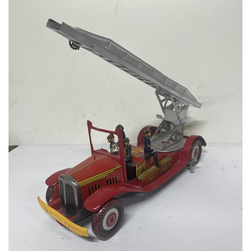 155 - Mettoy vintage tin plate fire engine,

36cm long