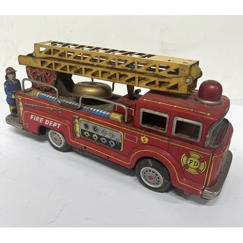 157 - Shokai Japan tin plate Fire Engine,

33cm long