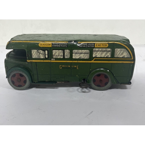 158 - Wells - Brimtoy clockwork tin plate bus. Green Line,

18cm long