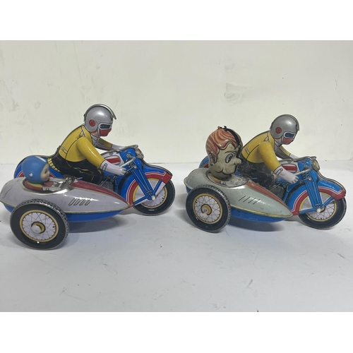 160 - Pair of vintage tin plate motorcycles with side cars