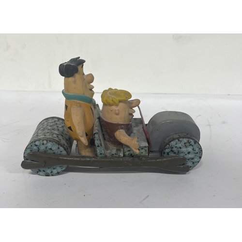 164 - Marx Toys Flintstones Fred & Barney car. 

19cm long