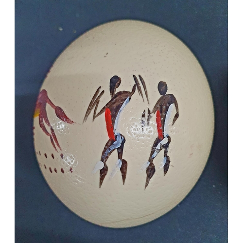 236 - Three hand-painted tourist Ostrich eggs and another (4)