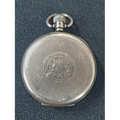 210 - Gents silver backed, open faced pocket watch with engraved shield to back plate