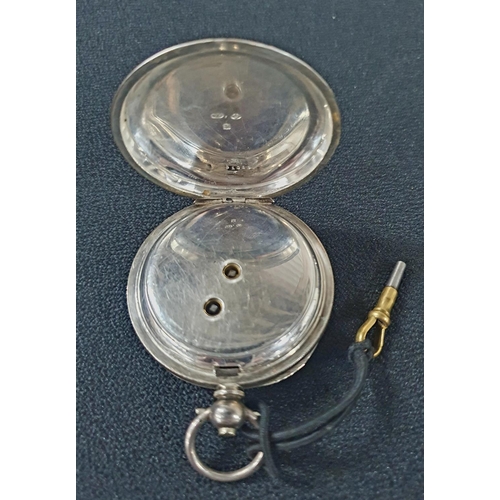 214 - Late Victorian silver pocket watch with engraved back plate with central shield motif and with key