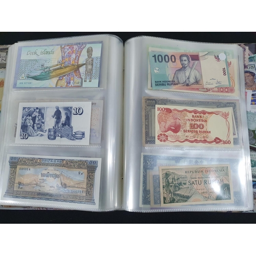 249 - Folder containing a very quantity of world banknotes (Qty)