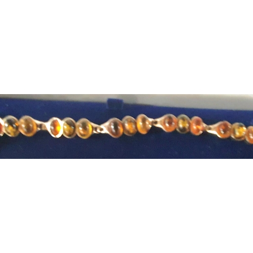 176 - Cased silver and Amber ladies bracelet