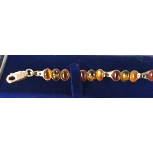 176 - Cased silver and Amber ladies bracelet