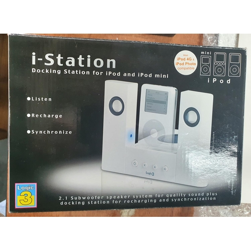 265 - Boxed, as new, I-Station docking station of ipod and ipod mini together with a boxed, as new Olympus... 