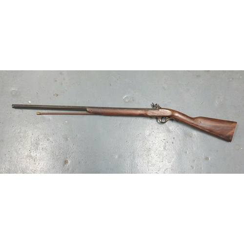 68 - Fine quality replica flintlock rifle with octagonal barrel