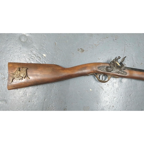 68 - Fine quality replica flintlock rifle with octagonal barrel