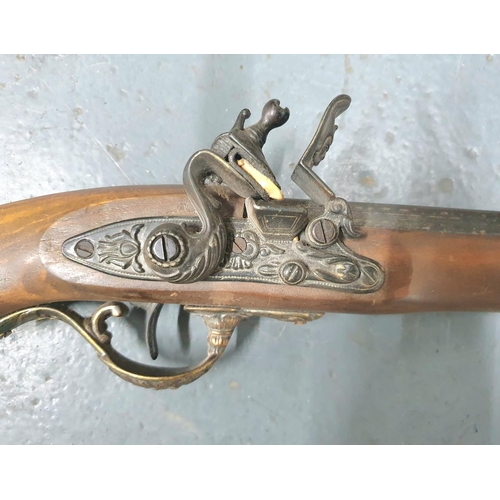 68 - Fine quality replica flintlock rifle with octagonal barrel