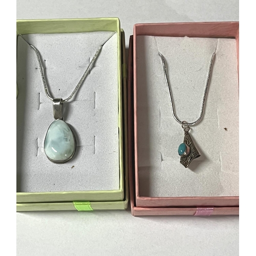 189 - Silver 925 blue and white stone pendant on chain along with silver cone shaped pendant with blue sto... 