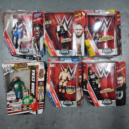 358 - Seventeen WWE action figures - Elite, NXT, Smackdown and Raw figures including The Rock, John Cena, ... 