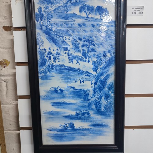 364 - Framed Chinese hand painted porcelain panel depicting a village scene, 

measures 22cm x 75cm