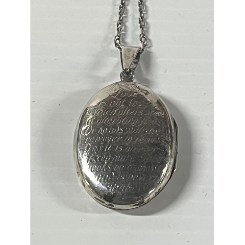 1 - Silver locket pendant on a chain,

11.7 grams