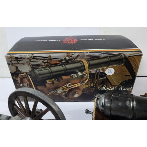 130 - A boxed British Naval model of a Napoleonic war cannon and carriage along with a French Louis XIV mo... 