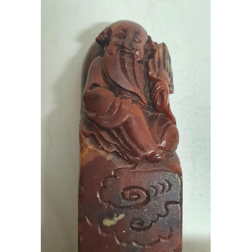 139 - Two antique carved Chinese stone seals, (1 still blank) depicting a Foo dog, the other an elder (2)