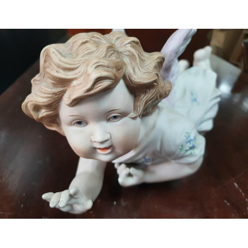 151 - Fine quality porcelain hanging girl angel,

approx 32 cm long