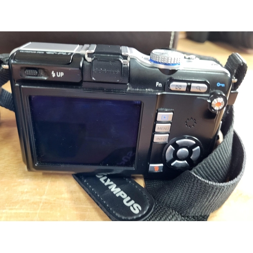 193 - Olympus Digital camera with charger and case