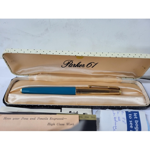 218 - Parker 61 cased pen as well as some watches and two lighters (Qty)