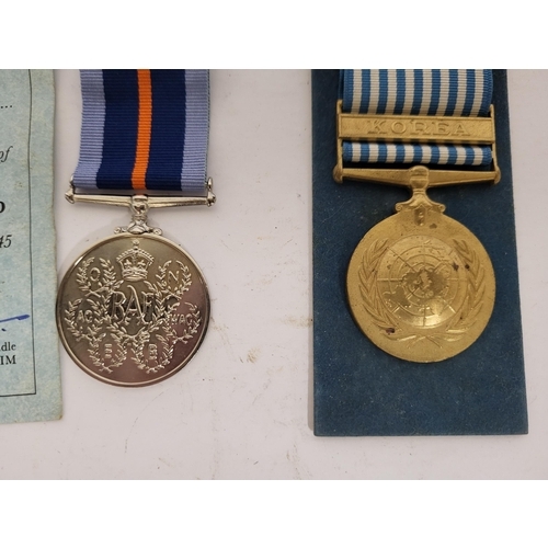 267 - Pair of medals one is a Bomber command commemorative medal and a UN Korean medal (2)