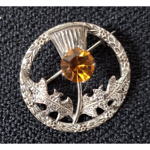 42 - Sterling silver Scottish themed brooch with matching silver bracelet with Orange coloured stones (2)