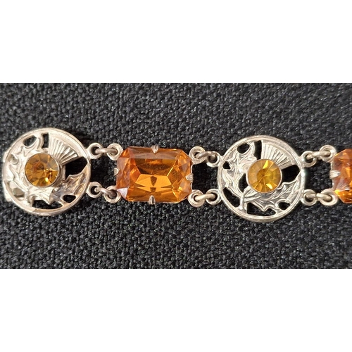 42 - Sterling silver Scottish themed brooch with matching silver bracelet with Orange coloured stones (2)