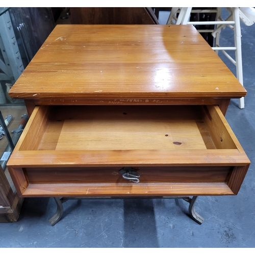 642 - Wooden side table with a drawer and ornate metal legs