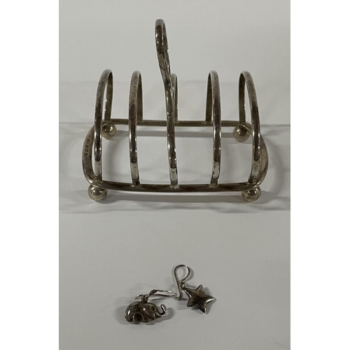 3 - Silver toast rack weighing 57.4g along with a pair of silver earrings weighing 2.0g