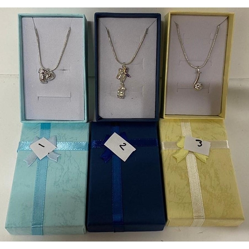 27 - Three 925 silver chains with varying pendants including a rope knot pendant (3)