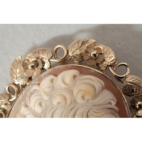 38 - Stunning large antique cameo of a lady in profile set in a hallmarked ornate 9ct yellow gold setting... 