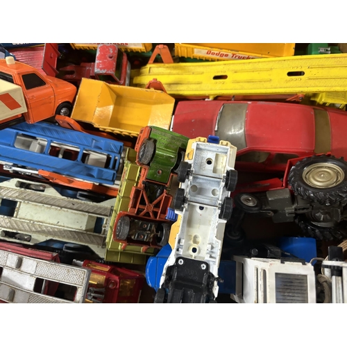 72 - Collection of Corgi and Dinky trucks including a boxed JCB excavator