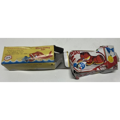 81 - 2 Boxed metal tin cat and fish, 1 is a whale eating fish