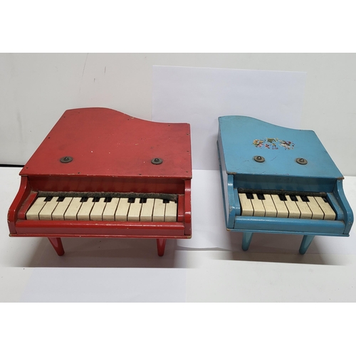 85 - Two miniature wooden pianos (2)