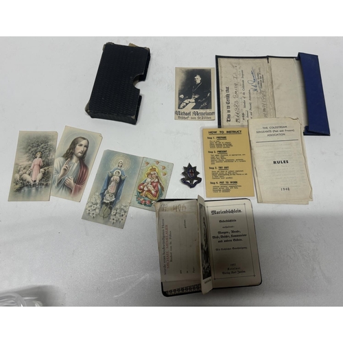 94 - Collection of items including Old Cold streamers association with paper and a German 1937 bible