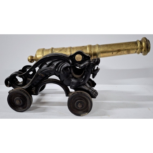 107 - Stunning large floor cannon cast in cast iron and brass,

Approx 47cm long