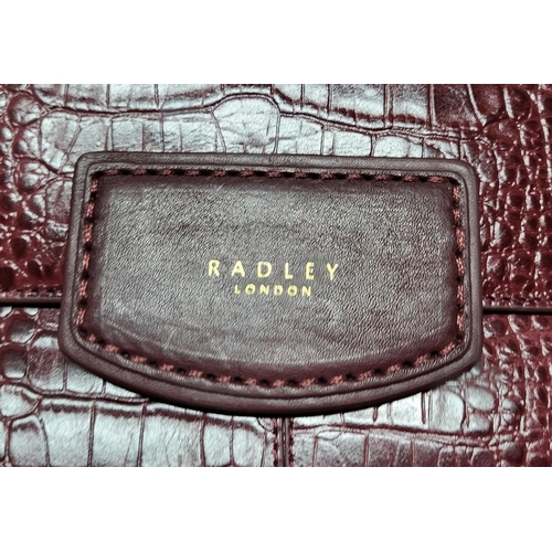 151 - Three handbags by Radley London (3)