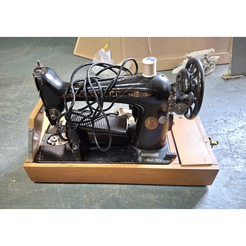 172 - Vintage Singer sewing machine with foot peddle and carry box