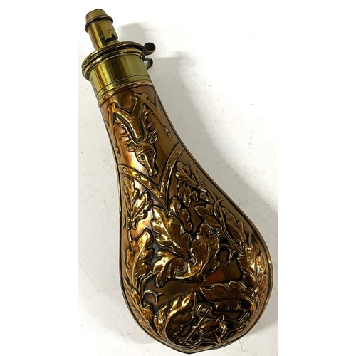 195 - Stunning brass and copper powder flask with acorn and animal decoration